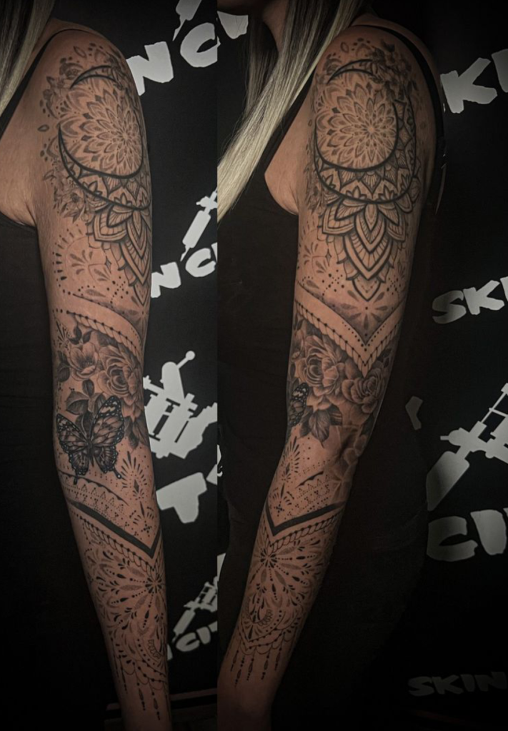 Filigranes Dotwork- und Ornament-Tattoo über den gesamten Arm